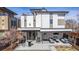 Modern exterior of the house showcasing the backyard patio with furniture and barbecue area at 2224 W 37Th Ave, Denver, CO 80211