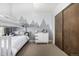 Cozy bedroom with a bunk bed, mountain-themed wall art, and a modern dresser with storage at 2224 W 37Th Ave, Denver, CO 80211