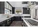 Contemporary kitchen with modern appliances, ample counter space, and stylish cabinetry at 2224 W 37Th Ave, Denver, CO 80211