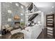 Comfortable living room with a stone accent wall, fireplace, and an open floor plan at 2224 W 37Th Ave, Denver, CO 80211