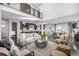 Open-concept living area with a view of the modern kitchen and dining area at 2224 W 37Th Ave, Denver, CO 80211