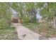 View of the driveway leading up to the house at 1645 Tamarac St, Denver, CO 80220