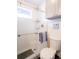 Updated bathroom with a glass shower door, tile flooring, and gray paint at 4312 Xavier St, Denver, CO 80212