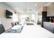 Kitchen island with granite counters, stainless steel sink, and pendant lighting at 4312 Xavier St, Denver, CO 80212