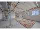 Spacious unfinished basement featuring bright windows and potential for customization and personalization at 1202 Lance Leaf Ct, Elizabeth, CO 80107