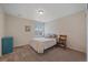 Bedroom featuring carpet flooring, single bed and natural light at 1202 Lance Leaf Ct, Elizabeth, CO 80107