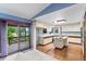Bright kitchen with access to the deck, updated appliances, and laminate floors at 11686 W 74Th Way, Arvada, CO 80005