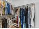 Spacious walk-in closet with ample hanging space and built-in shelving at 6545 W 84Th Way # 132, Arvada, CO 80003