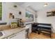 Charming kitchen nook with a table and view of the yard from the window at 6545 W 84Th Way # 132, Arvada, CO 80003