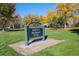 The sign for Melvin F. Silverman Park with colorful trees and a covered picnic area in the background at 4311 Del Rio Ct, Denver, CO 80239