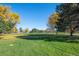 Beautiful park with green grass and lots of mature trees at 4311 Del Rio Ct, Denver, CO 80239