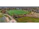 An aerial view features an immaculately maintained sports field, perfect for community activities at 4311 Del Rio Ct, Denver, CO 80239