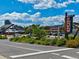 Denver Zoo entrance on a sunny day, showcasing a Gathering-friendly destination with diverse attractions at 1121 Albion St # 804, Denver, CO 80220