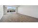 Spacious bedroom with large window leading out to a balcony at 1121 Albion St # 804, Denver, CO 80220