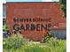 Denver Botanic Gardens sign amidst lush landscaping, offering a picturesque and inviting entrance at 1121 Albion St # 804, Denver, CO 80220