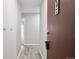 Bright hallway with a neutral color scheme and wood-look flooring at 1121 Albion St # 804, Denver, CO 80220