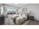 Serene main bedroom with a balcony, and large windows at 1121 Albion St # 804, Denver, CO 80220