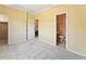 Bedroom with neutral walls, carpet, and doors leading to closet and bathroom at 1344 Royal Troon Dr, Castle Rock, CO 80104