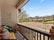 Charming front porch featuring comfortable seating and scenic neighborhood views at 1344 Royal Troon Dr, Castle Rock, CO 80104