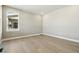 A bright bedroom with wood floors, natural light and neutral walls at 9329 Russell Cir, Arvada, CO 80007