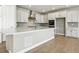 Kitchen with a large island, stainless steel appliances, and plenty of cabinet space at 9329 Russell Cir, Arvada, CO 80007