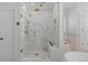 Spa-like bathroom with a large walk-in shower, marble finishes, and built-in seating at 5320 S Race Ct, Greenwood Village, CO 80121