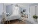 Light and airy bedroom with a comfortable bed, and plenty of natural light at 5320 S Race Ct, Greenwood Village, CO 80121