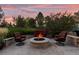 Brick fire pit with comfortable seating area at 5320 S Race Ct, Greenwood Village, CO 80121