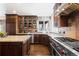 Spacious kitchen with corner sink and stainless steel appliances at 5320 S Race Ct, Greenwood Village, CO 80121