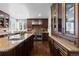 Modern kitchen with stainless steel appliances and granite island at 5320 S Race Ct, Greenwood Village, CO 80121