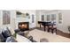 Cozy living room with a fireplace and comfortable seating at 5320 S Race Ct, Greenwood Village, CO 80121