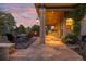 Flagstone patio with outdoor seating and fire pit at 5320 S Race Ct, Greenwood Village, CO 80121