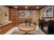 Finished basement wine cellar with custom wood racking at 5320 S Race Ct, Greenwood Village, CO 80121