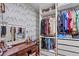 Walk-in closet with drawers, shelving and make-up vanity at 5512 S Greenwood St, Littleton, CO 80120