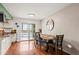 Dining room with table and slider to outdoor patio at 5512 S Greenwood St, Littleton, CO 80120