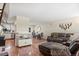 Spacious living room with open floor plan and hardwood floors at 5512 S Greenwood St, Littleton, CO 80120