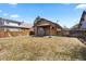 View of the backyard featuring a covered patio and a fenced yard at 3225 S Sherman St, Englewood, CO 80113