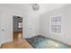 Beautiful bedroom featuring hardwood floors and a decorative window at 3225 S Sherman St, Englewood, CO 80113