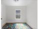 Bedroom featuring hardwood floors and a bright window at 3225 S Sherman St, Englewood, CO 80113