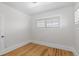 Cozy bedroom with hardwood floors and a bright window at 3225 S Sherman St, Englewood, CO 80113