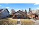 Street view of charming bungalow with covered porch and sidewalk at 3225 S Sherman St, Englewood, CO 80113