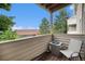 Covered balcony offers a private outdoor space at 7468 S Alkire St # 205, Littleton, CO 80127
