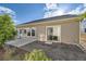 Backyard featuring a gravel bed, patio, and lush landscaping at 5495 Espana Ct, Denver, CO 80249