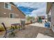 Charming backyard patio, perfect for entertaining with ample seating at 5495 Espana Ct, Denver, CO 80249