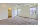 This bedroom has plush carpeting, recessed lighting, and a connected closet at 5495 Espana Ct, Denver, CO 80249