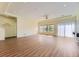 Spacious living room with hardwood floors and natural light at 5495 Espana Ct, Denver, CO 80249