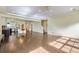 Open floor plan showcasing the living room, dining area, and kitchen, perfect for entertaining and Gathering gatherings at 5495 Espana Ct, Denver, CO 80249