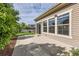 Private patio area with outdoor space and sliding glass door entrance, ideal for relaxing or outdoor gatherings at 5495 Espana Ct, Denver, CO 80249