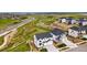 Stunning aerial view of the home and neighborhood nestled in a picturesque setting at 9382 Quaker St, Arvada, CO 80007