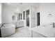 Modern bathroom with soaking tub, glass-enclosed shower, and double vanity sinks with granite countertops at 9382 Quaker St, Arvada, CO 80007